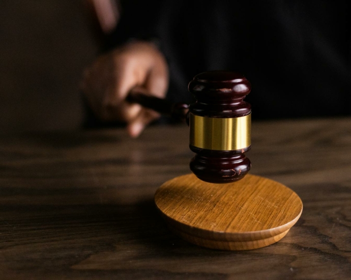 Brown Wooden Gavel on Brown Wooden Table