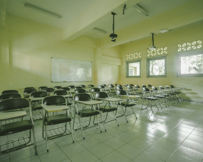 a room with a bunch of chairs in it