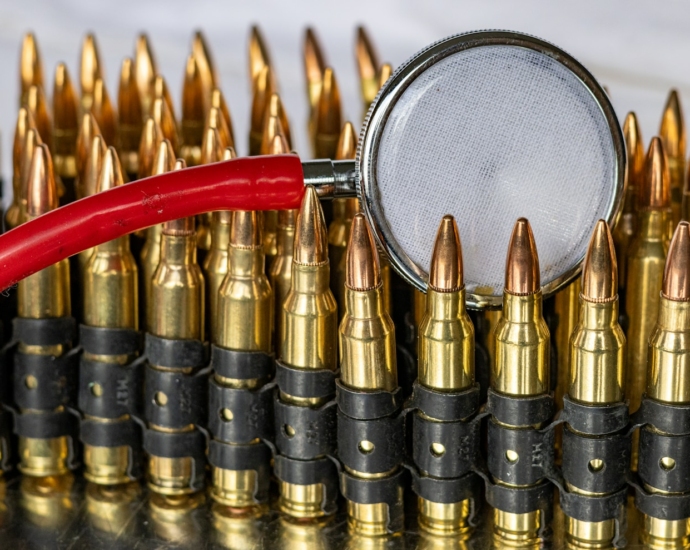 a magnifying glass over a bunch of bullet casings