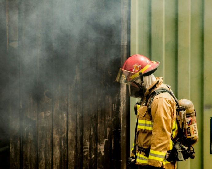 shallow focus photo of firefighter