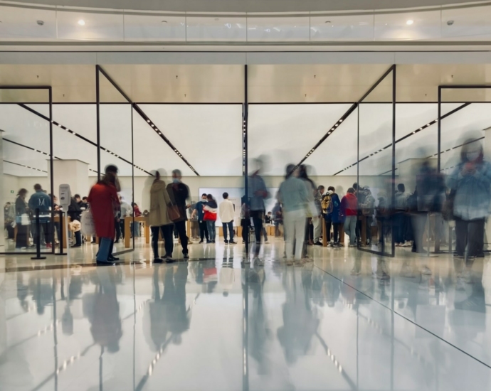 people walking on white floor tiles