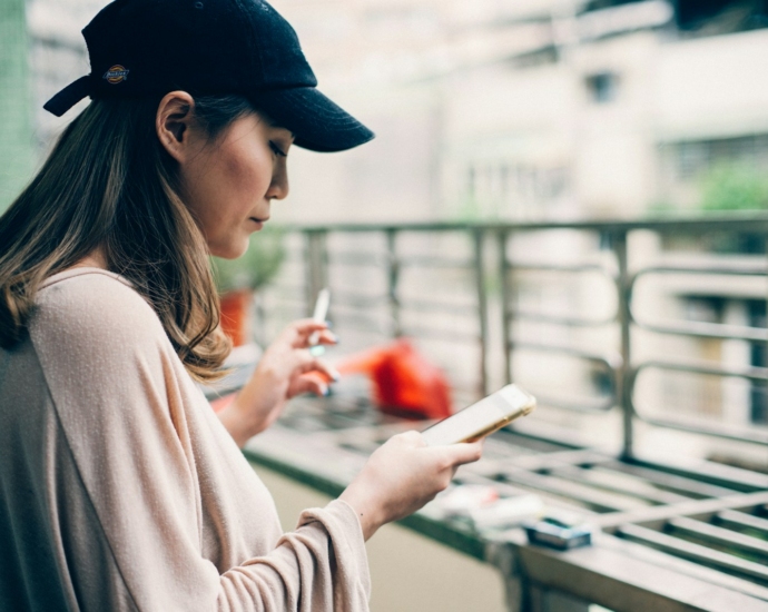 woman looking at phone