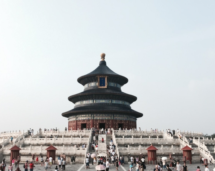 brown and white temple under clear blue sky