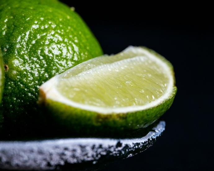 sliced lime on grey bowl