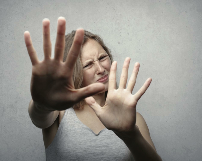 Woman in Gray Tank Top Looking Frightened