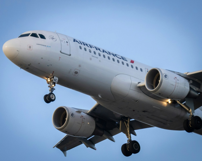 white passenger plane in the sky during daytime