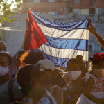 people holding flags during daytime