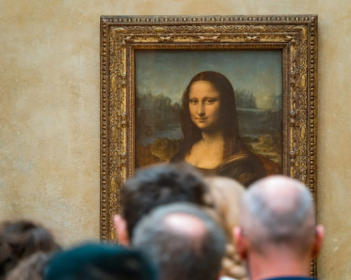 woman in black top standing near people