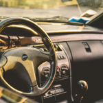 shallow focus photography of car steering wheel