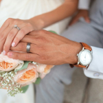 man and woman holding hands