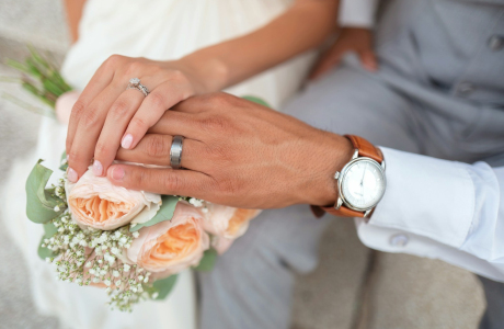 man and woman holding hands