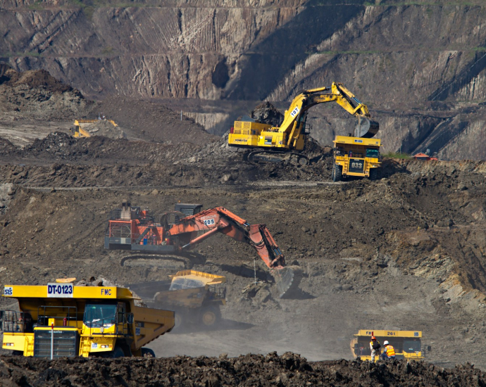 photography of excavators at mining area