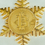 a bitcoin snowflake with a bitcoin on it