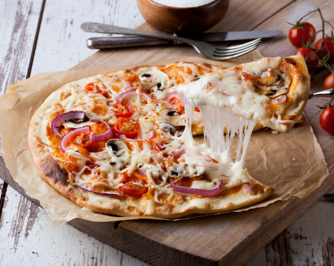 pizza on brown wooden tray