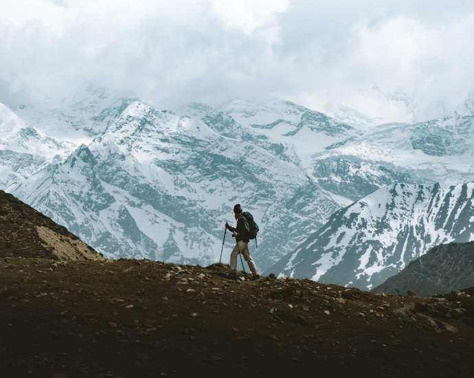 man standing on mountain