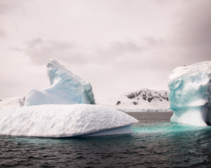 two ice bergs during cloudy day